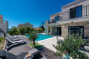 an image of a villa with a swimming pool at Villa Lav Lux Elegant Residence with Private Heated Pool in Mlini