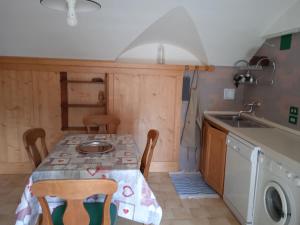 Η κουζίνα ή μικρή κουζίνα στο Casetta CuCù +6 φωτογραφίες