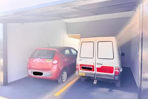 a car is parked in a parking garage at Vila São José 2 in Ourinhos +20 photos