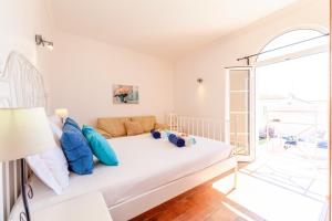 Ένα ή περισσότερα κρεβάτια σε δωμάτιο στο Villa Sunny Joy by Algarve Vacation +42 φωτογραφίες