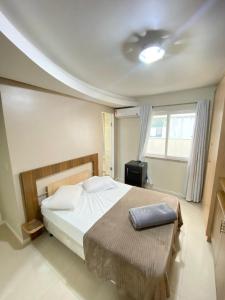 Voodi või voodid majutusasutuse Espaço Com Vista Para O Mar Na Avenida Atlântica toas