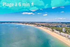 ein Bild von einem Strand mit dem Text: „Setzen Sie ein Minimum ein.“ in der Unterkunft T3 centre ville 70 m2 avec terrasse in La Baule