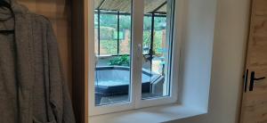 Fotografie z fotogalerie ubytování Atelier des Rêves, gîte pour deux personnes avec spa près de la mer v destinaci Gonneville-en-Auge