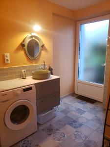 Koupelna v ubytování Chambre D'hotes - La Bonbonnière