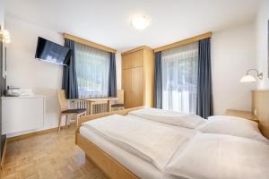 Ένα ή περισσότερα κρεβάτια σε δωμάτιο στο Pivan Apartments