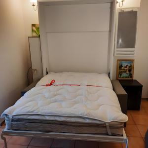 Postel nebo postele na pokoji v ubytování La Voile de Nacre Appt 50 M Plage