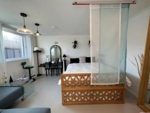 a bedroom with a bed with a glass canopy at Secret Villa Seoul , Korean Traditional and morden mix Design in Seoul