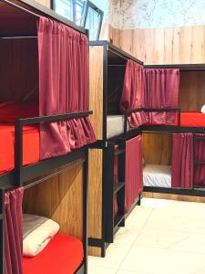 Ένα ή περισσότερα κρεβάτια σε δωμάτιο στο Velvet Hostels Pacifico