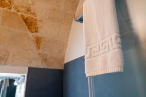 Koupelna v ubytování Dimora Donna Lucia + 7 fotografií