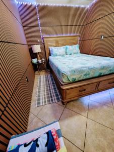 a bedroom with a bed in a room at 2 Minute Walk to Beach & Downtown! in Cocoa Beach