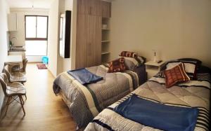 Postel nebo postele na pokoji v ubytování Único, Selecto y precioso departamento Ave Paraíso + 45 fotografií