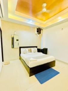 Postel nebo postele na pokoji v ubytování The Marc Blu Prime International Hotel