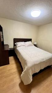 Postel nebo postele na pokoji v ubytování Modern apartment in Arequipa
