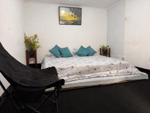 Postel nebo postele na pokoji v ubytování Succulent Homestay