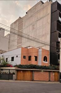 a building in front of a building at Haku Hostel in Lima