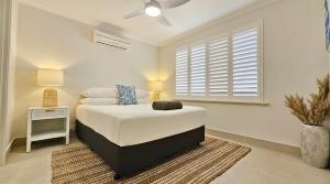 En eller flere senge i et værelse på Pelican Shore Villa 21 - Kalbarri, WA