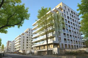 ポズナンにあるPodgórnik Modern Stayの木立の高い白い建物