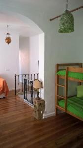 Postel nebo postele na pokoji v ubytování Casas do Patio Sem Cantigas 3
