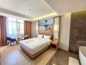 Afbeelding uit fotogalerij van Flower International Hotel in Djoeba