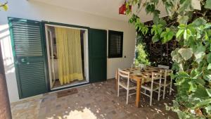 a dining room with a table and a window at Holiday house with a parking space Jadrija, Sibenik - 24931 in Jadrija +20 photos