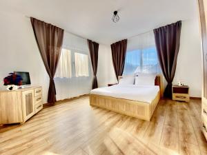 Ένα ή περισσότερα κρεβάτια σε δωμάτιο στο Premium mountain view chalet +17 φωτογραφίες