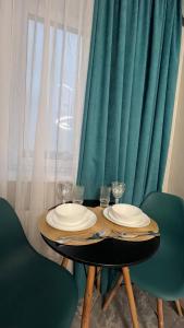 Гостиная зона в Cozy 2-room apartment in the center of Irpin