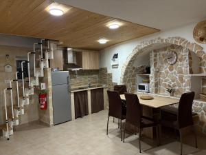 Η κουζίνα ή μικρή κουζίνα στο Praia House Ostuni