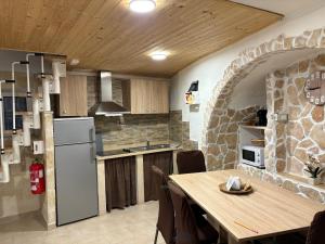 Η κουζίνα ή μικρή κουζίνα στο Praia House Ostuni +12 φωτογραφίες