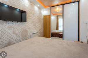 TV a/nebo společenská místnost v ubytování Monte Lux Zlatibor - spa i wellnes