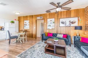 a living room with a couch and a table at Full Triplex in Central Tucson EV charging in Tucson
