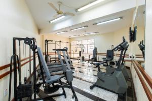 a gym with treadmills and elliptical machines at Hotel Suárez São Leopoldo in São Leopoldo +34 photos