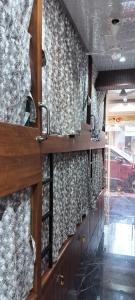 a view of a curtain in a bus at Sunlight Dormitory in Mumbai