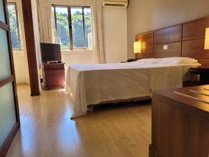 Postel nebo postele na pokoji v ubytování Apartamento no Hotel Prinz