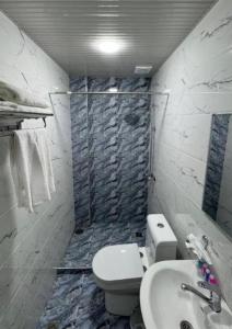 Fotografie z fotogalerie ubytování Azizbek INN Hotel White v destinaci Yakkasaray