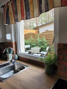 Imagen de la galería de Domek na lipowym wzgórzu, en Długie