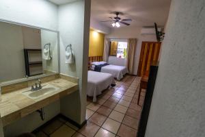 Photo de la galerie de l'établissement Hotel Lacantum, à San José