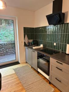 Køkken eller tekøkken på Komfortable Stadtwohnung mit Terrasse