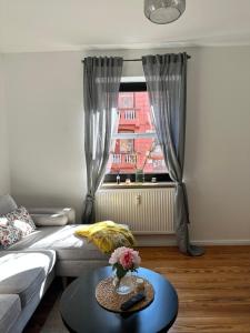 Et opholdsområde på Komfortable Stadtwohnung mit Terrasse