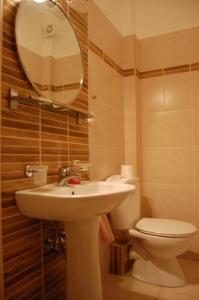 Koupelna v ubytování Hotel Achillion
