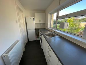 Fotografie z fotogalerie ubytování Luqman Property v destinaci Swansea