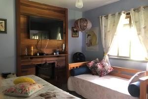 Katil atau katil-katil dalam bilik di Casa no Sítio Solar di Stella