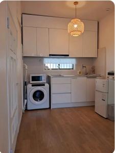 Η κουζίνα ή μικρή κουζίνα στο Sodam stay