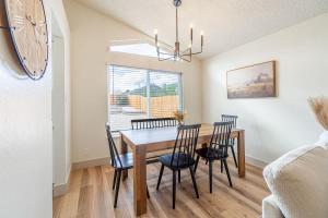 a dining room with a table and chairs at Modern Western Retreat Pet Friendly 4 Bed 2 Bath in Reno +33 photos