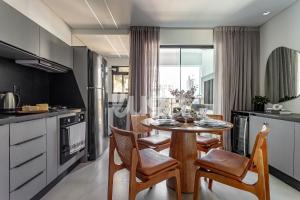 Kuchyň nebo kuchyňský kout v ubytování Conforto & Lazer – Oásis de Itapema