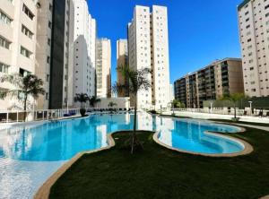 Bazén v ubytování Moderno em Shopping 4Q - Vista Panorâmica nebo v jeho okolí