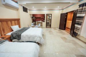 Kuchyň nebo kuchyňský kout v ubytování Casa Margarito Jalatlaco