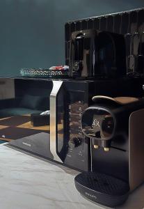 Posezení v ubytování L'Atelier de l'Émeraude + 14 fotografií