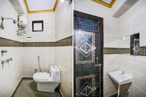 Koupelna v ubytování Hotel O DS Palace + 21 fotografií