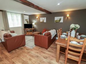 TV a/nebo společenská místnost v ubytování Duchess Cottage