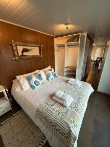 Giường trong phòng chung tại Cabañas AlSur Patagonia